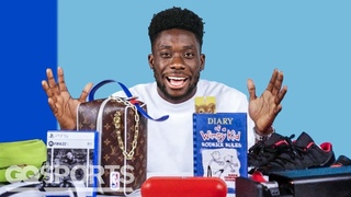10 Things Canadian Footballer Alphonso Davies Can't Live Without | GQ Sports