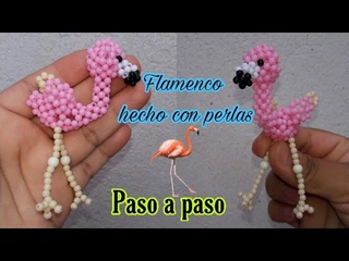 flamenco hecho con perlas o cuentas. Animales 3d con chaquiras