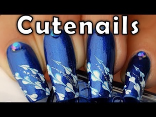 Nail art tutorial : blue feathers design